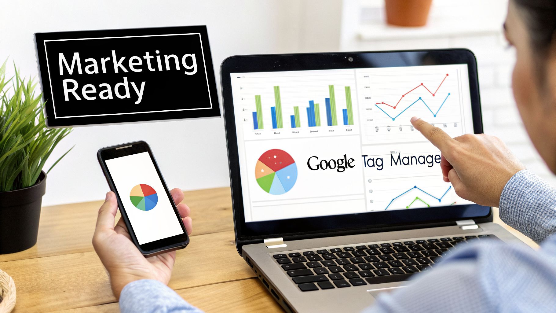 A person reviews digital marketing data on a laptop and smartphone, with a 'Marketing Ready' sign.