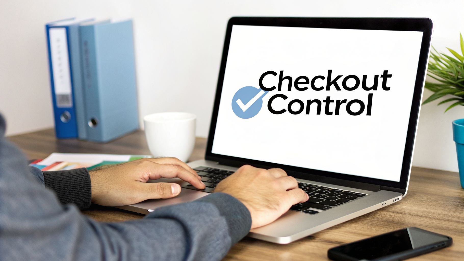 Person typing on a laptop displaying 'Checkout Control' with a checkmark icon on the screen.