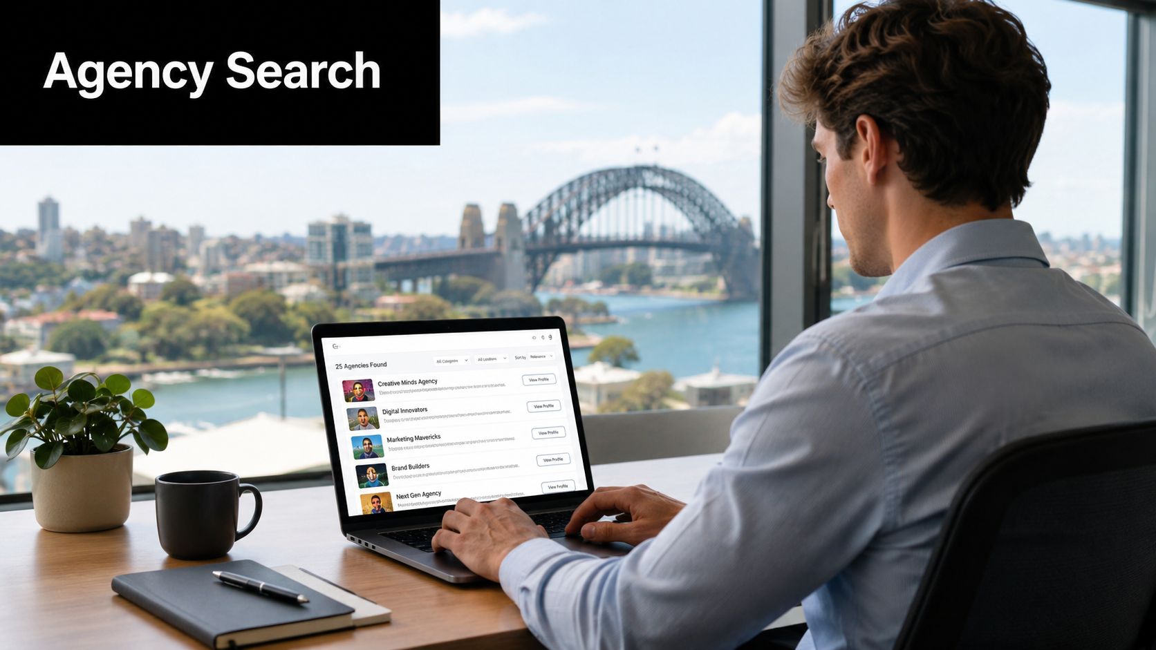 A professional man searching for a Shopify agency in Australia while working on his laptop by a window.