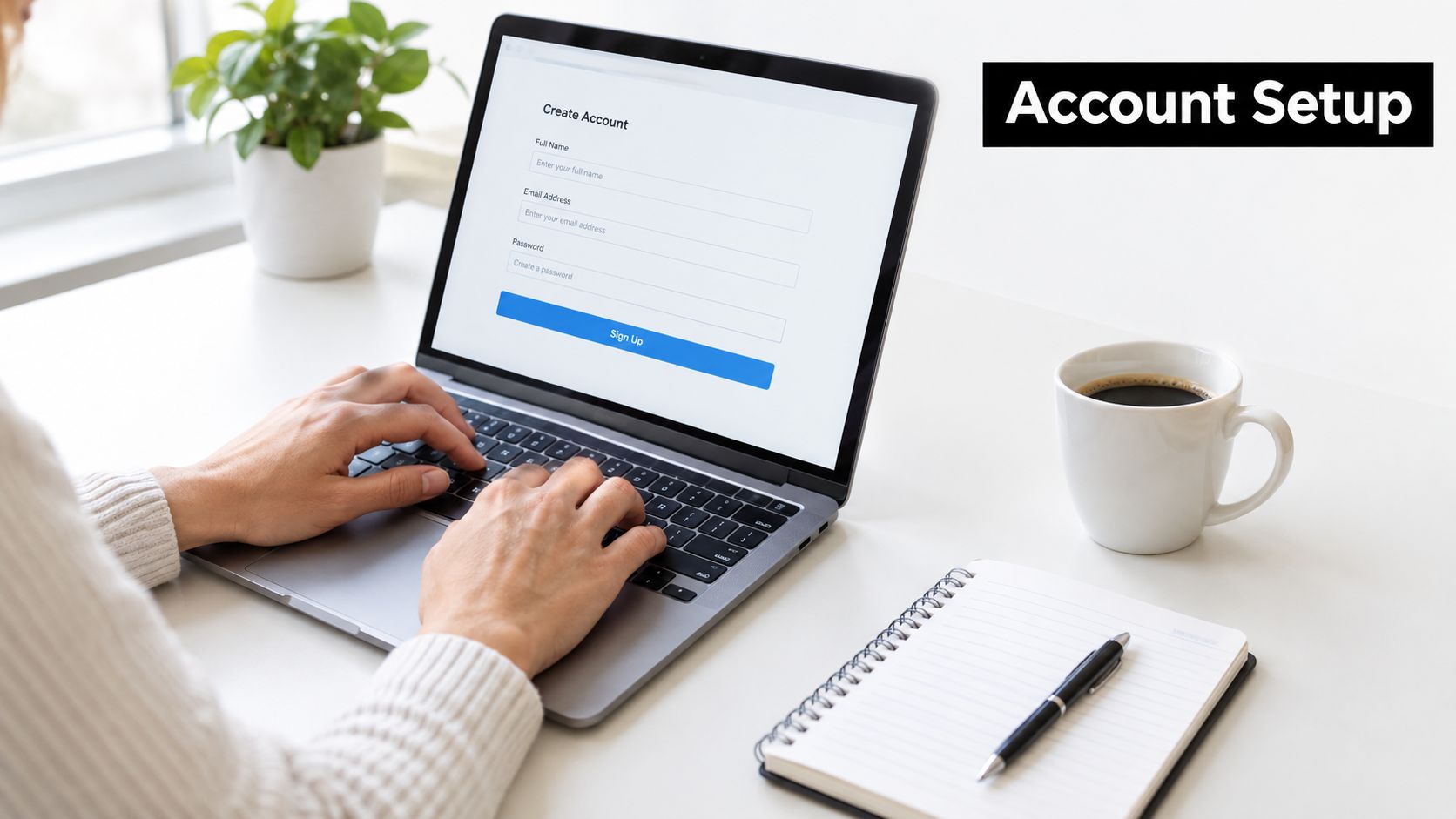A person types on a laptop computer to create an account for Google grants for charities.